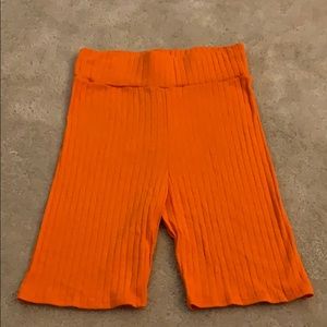 PRETTYLITTLETHING Orange Ribbed Biker Shorts 6 US